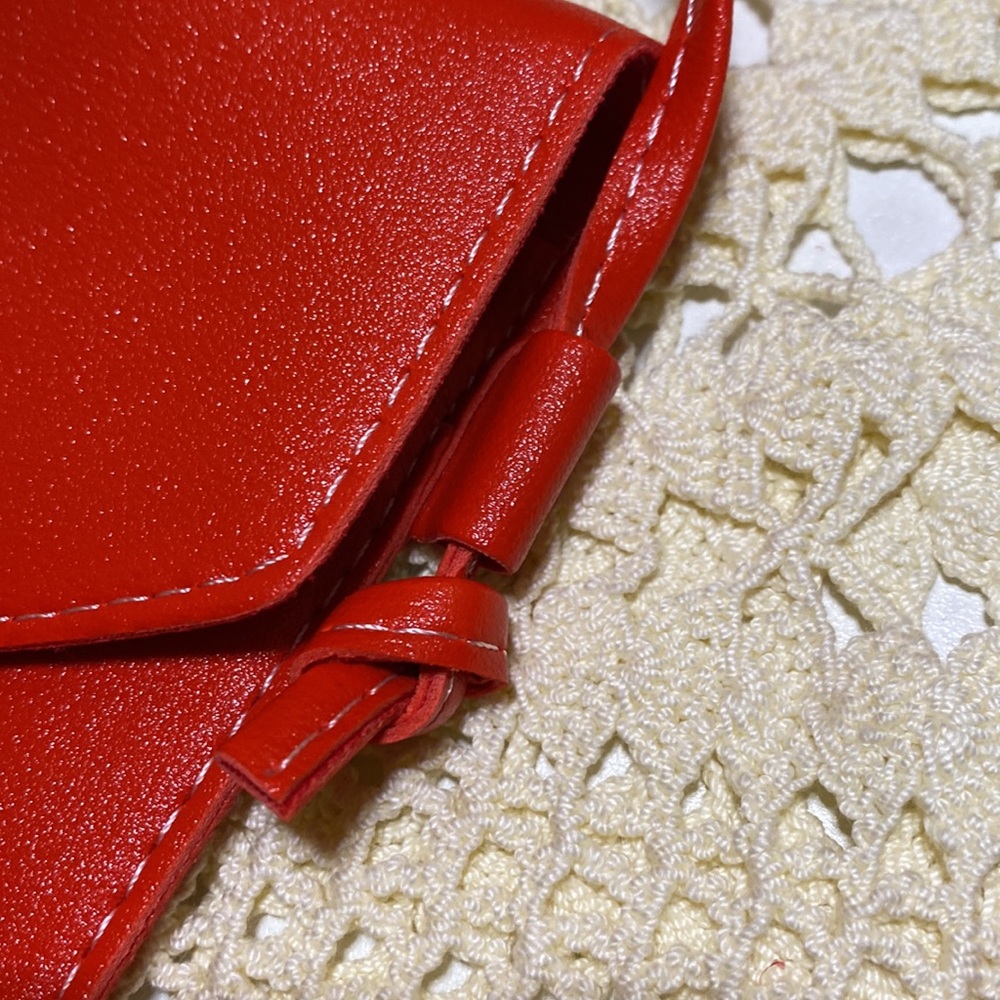3/$15 Red faux leather crossbody with heart snap and clear back - Picture 8 of 10